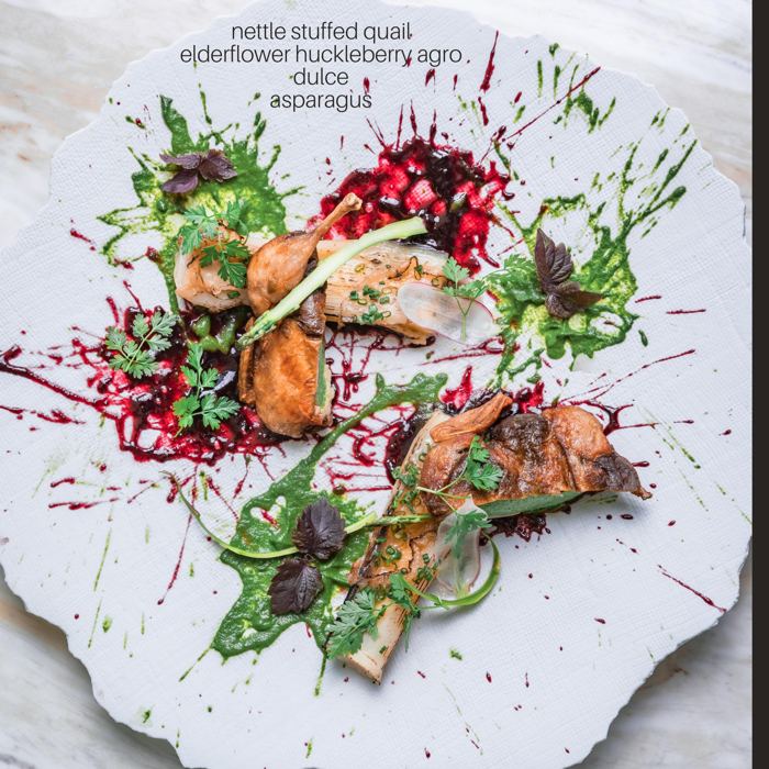 Plated dish: nettle stuffed quail, elderflower huckleberry